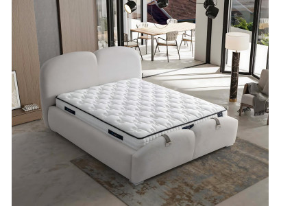 Moderne witte bed met stof en houten matras