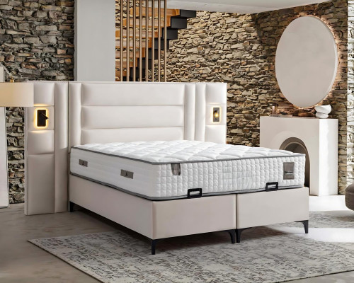 Elegante witte bed met stof en houten matras