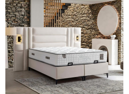 Elegante witte bed met stof en houten matras