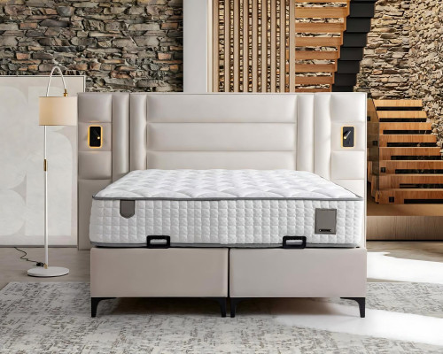 Elegante witte bed met stof en houten matras