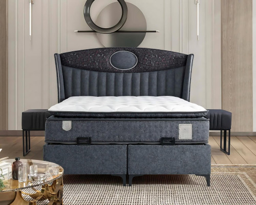 Elegante stoffen en houten bed met matras