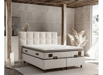 Elegante bed met stoffen matras
