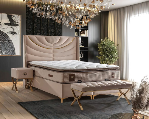 Lichte kleur bed met stoffen en houten matras