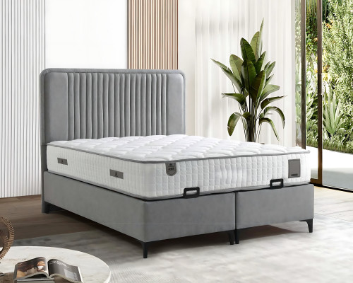 Elegante stoffen en houten bed met matras