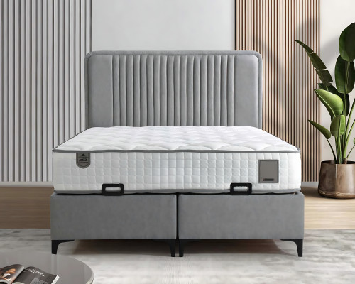 Elegante stoffen en houten bed met matras