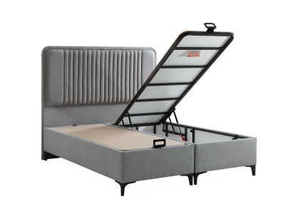 Elegante stoffen en houten bed met matras