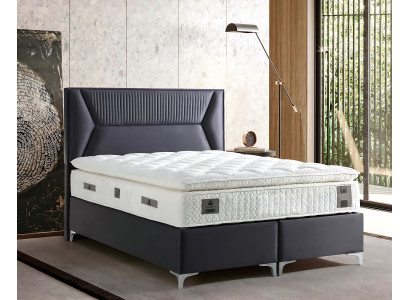 Elegante grijze bed met stoffen en houten matras