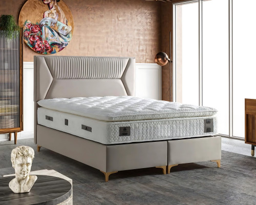 Lichtbruine bed met stoffen en houten matras