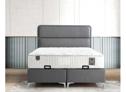 Moderne grijze bed met stoffen en houten matras