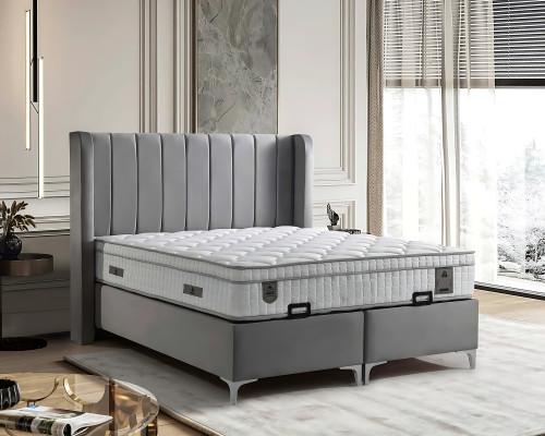 Elegante stoffen en houten bed met matras