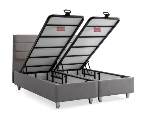 Elegante stoffen en houten bed met matras