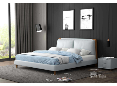 Moderne tweepersoonsbed van 180x200 in wit lederen design op houten poten.