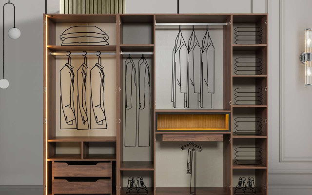 Bruine slaapkamer houten meubels textielbed nachtkastjes commode kast