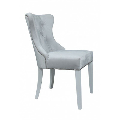 Grijze gestoffeerde Chesterfieldstoel ontworpen door Einitzer fauteuils voor de eetkamer.