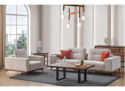 Witte gestoffeerde bankstel met driezitsbank, fauteuil, salontafel en bijzettafels