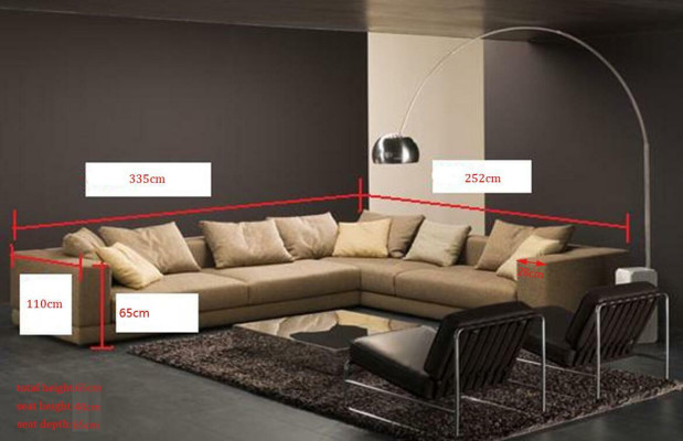 Moderne gestoffeerde stoffen bank in hoekbank design met stoffen bekleding