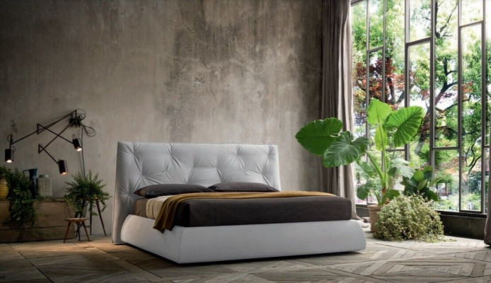 Ontwerp inrichting gestoffeerd bedframe luxe bed hotel royal meubels stoffen bedden