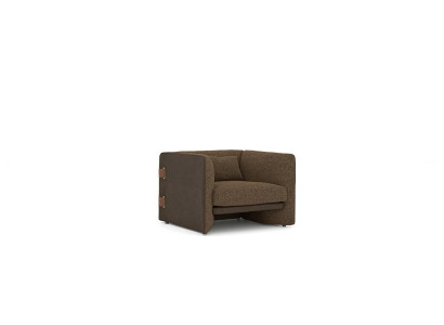 Bruine fauteuil woonkamer inrichting luxe textiel gestoffeerd meubilair modern design.