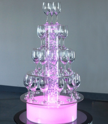 Champagnetoren, sekt toren, waterzuil, verlichte plankzuilen
