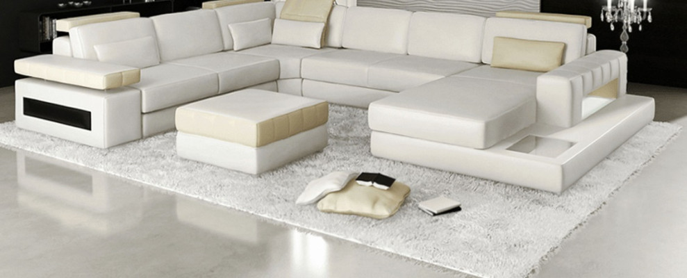 Grote U-vormige hoekbank bank bankstel bekleding leder textiel stof woonlandschap