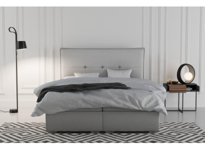Boxspring bed hotel dubbel textiel grijs luxe bedden gestoffeerde bedlade functie.