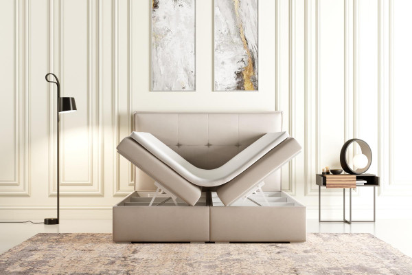 Boxspring bed hotel dubbel textiel grijs luxe bedden gestoffeerde bedlade functie.