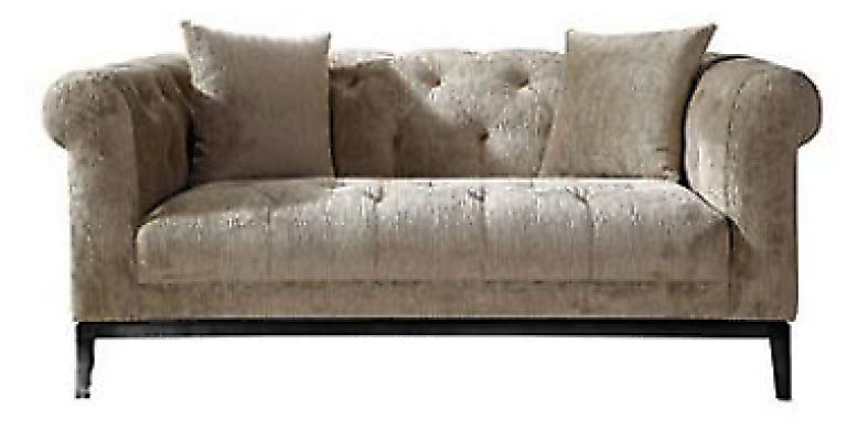 Gezellige beige Chesterfield driezitsbank voor in de woonkamer.