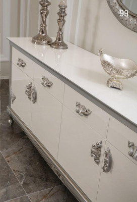 Witte ladekast met handige laden en elegante planken.