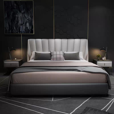Luxe tweepersoons hotelbedden 180x200cm slaapkamer grijs lederen bed.