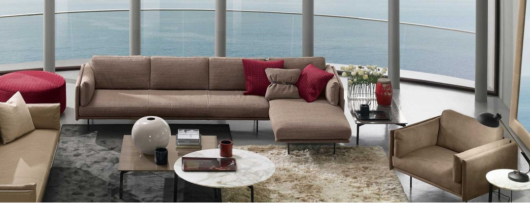 Bruine hoekbank L-vorm bank design gestoffeerd modern textiel woonkamer