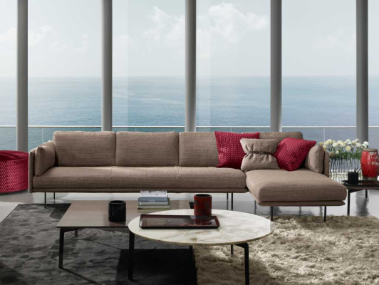 Bruine hoekbank L-vorm bank design gestoffeerd modern textiel woonkamer
