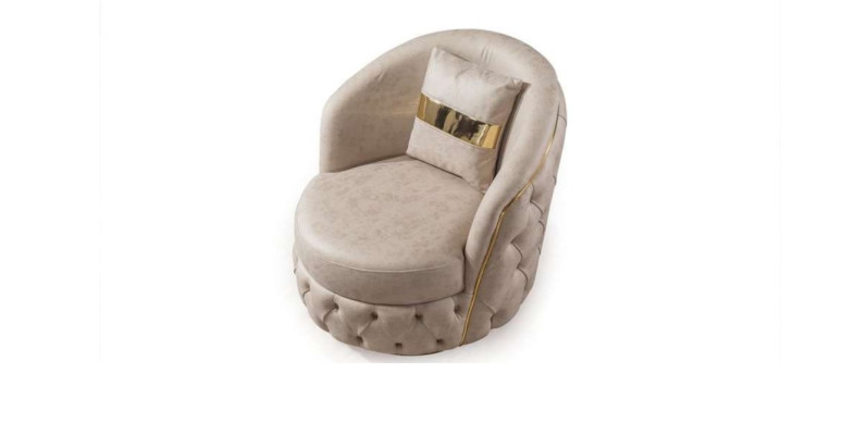 Een luxueuze, moderne fauteuil in een lichte beige tint van Chesterfield