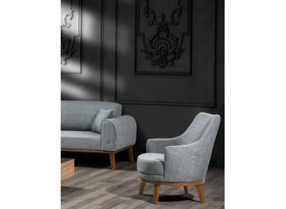 Fauteuil van 1 zitplaats voor in de woonkamer, houten frame met textielbekleding.