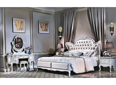 Kingsize tweepersoonsbed met lederen hoofdeinde in klassiek Chesterfield-stijlontwerp.