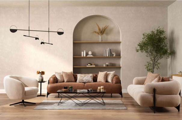 Bruin-witte woonkamer bankstel exclusieve driezitsbanken fauteuils.