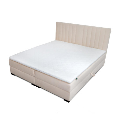 Comfortabel en functioneel bed is gemaakt van hoogwaardig materiaal in een moderne stijl.