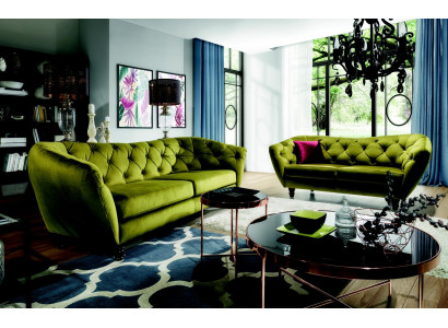 Dries zits bank met luxe Chesterfield-rugleuning in een elegante groene tint