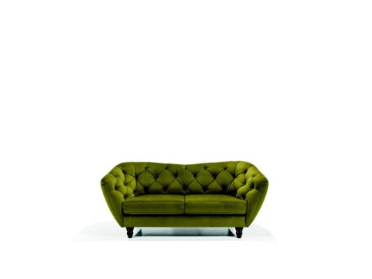 Dries zits bank met luxe Chesterfield-rugleuning in een elegante groene tint