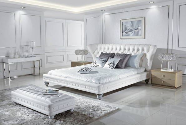 Ontwerper tweepersoonsbed bed bedden leer Chesterfield hotel luxe slaapkamer