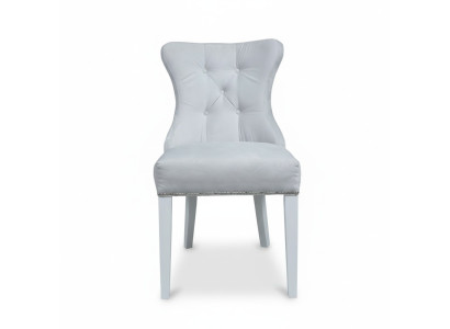 Grijze gestoffeerde Chesterfieldstoel ontworpen door Einitzer fauteuils voor de eetkamer.