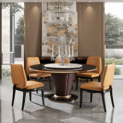 Luxe design eetkamer met ronde tafel en 6 metalen leunstoelen.