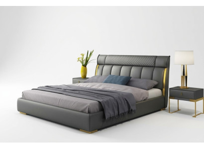 Modern grijs leren slaapkamer met gouden roestvrijstalen accenten.