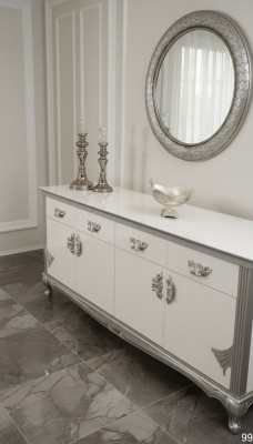 Witte ladekast met handige laden en elegante planken.