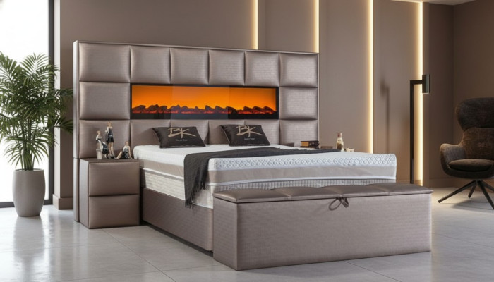 Elegante eigentijdse tweepersoonsbed met ruim gestoffeerd hoofdeinde.