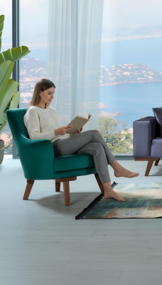 Woonkamer fauteuil met 1 zitplaats in groene kleur, gemaakt van polyester stof in een modern design.