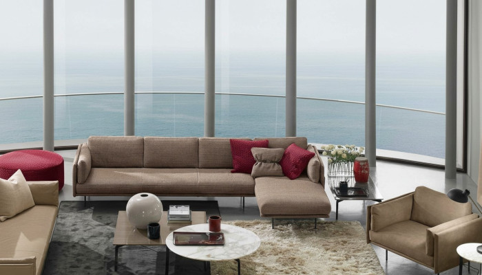Bruine hoekbank L-vorm bank design gestoffeerd modern textiel woonkamer