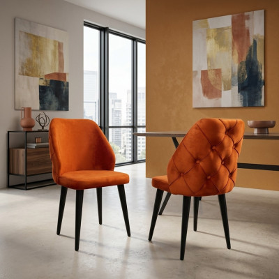Gevoerde houten stoel oranje Chesterfield op zwarte poten de eetkamer.