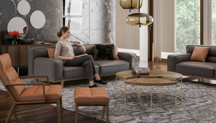 Bruine woonkamerset Luxueuze 3-zits Stivloller fauteuil Beklede poef