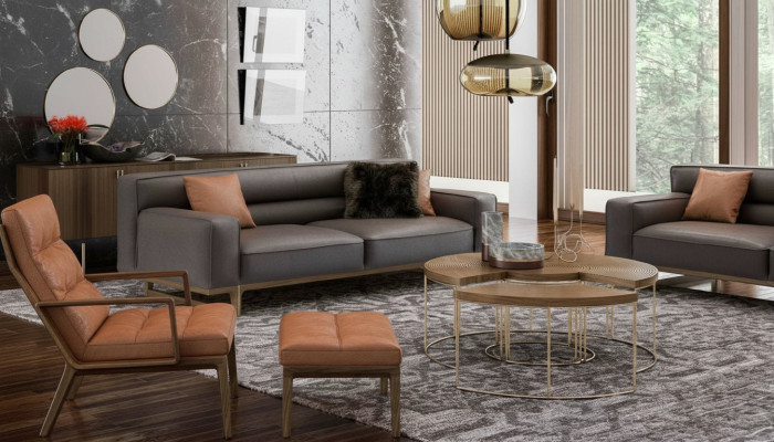 Bruine woonkamerset Luxueuze 3-zits Stivloller fauteuil Beklede poef