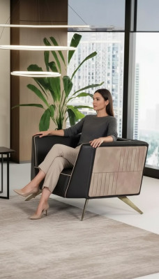 Luxe zwarte fauteuil voor de werkkamer, zitplaats modern design kantoormeubilair.